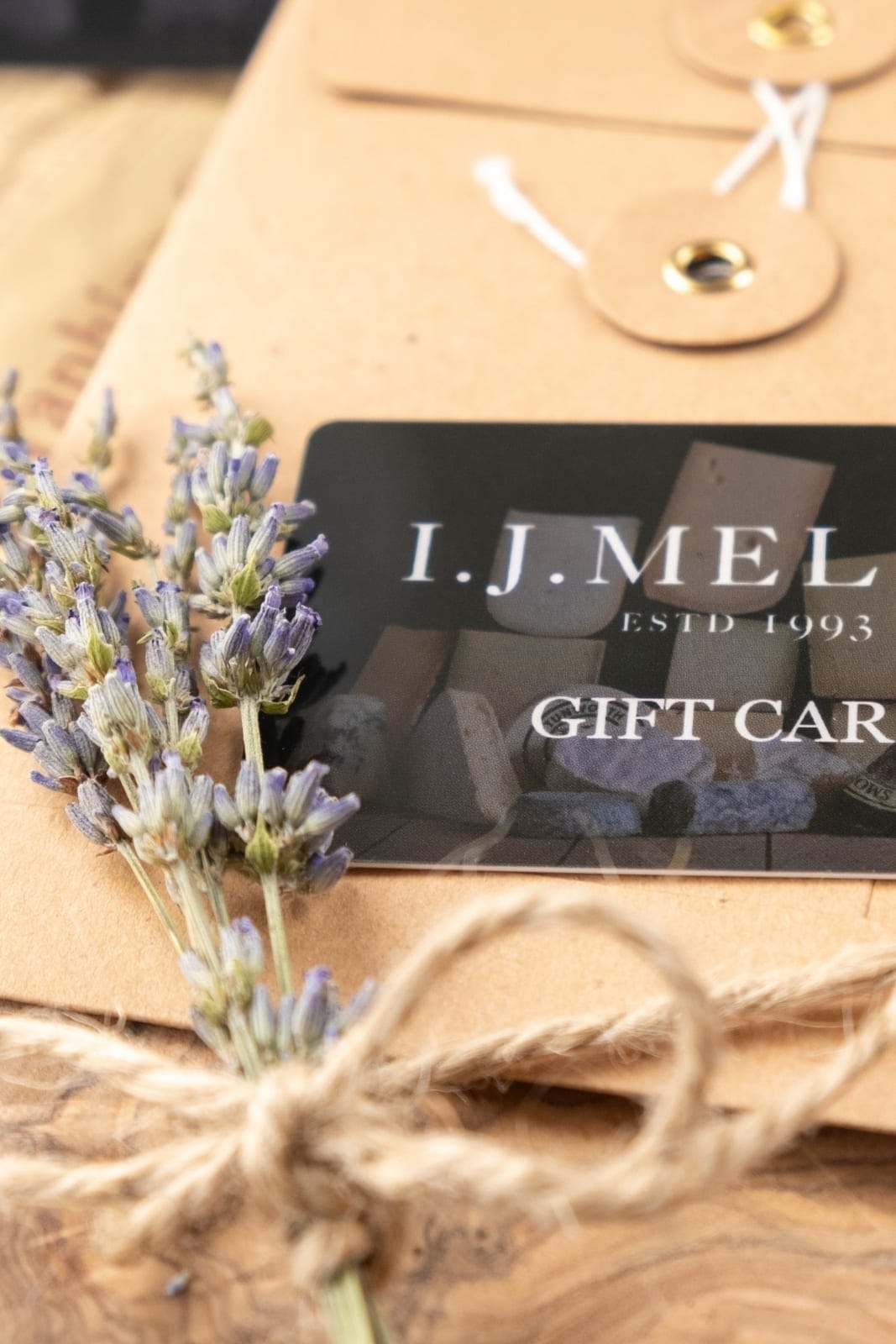 A Mellis gift card on kraft paper